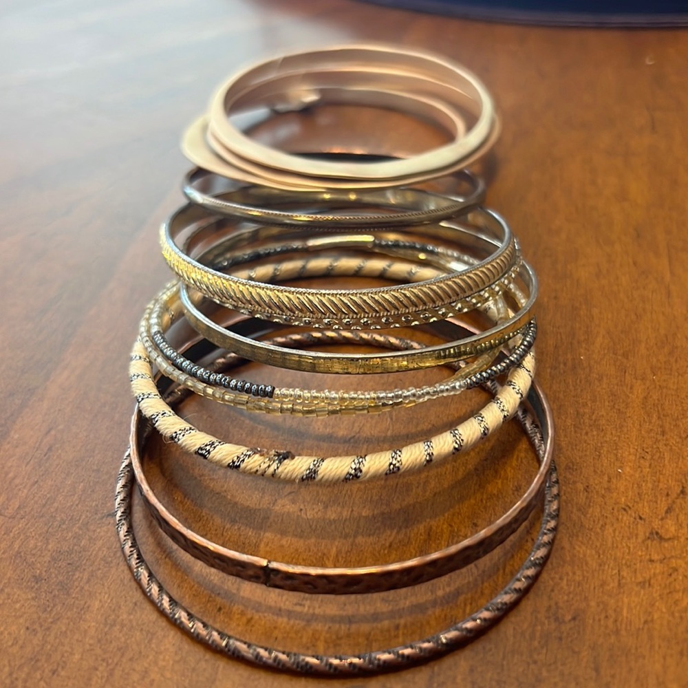 Assorted gold colored bangles